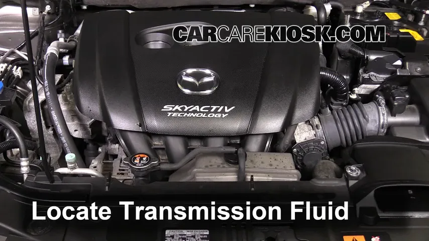 2014 Mazda 3 Touring 2.0L 4 Cyl. Sedan Líquido de transmisión Controlar nivel de líquido